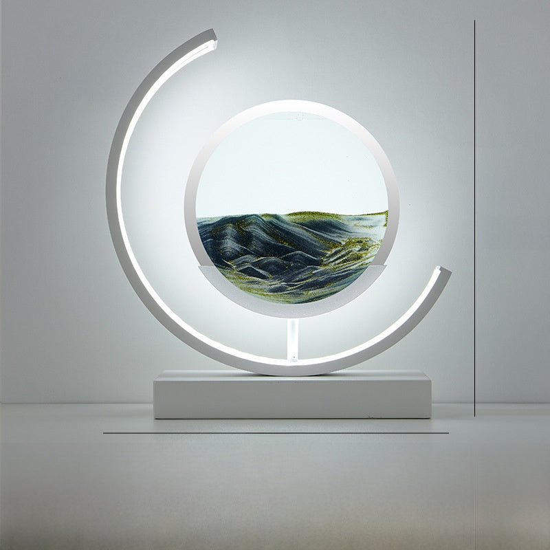 Glass hourglass table lamp