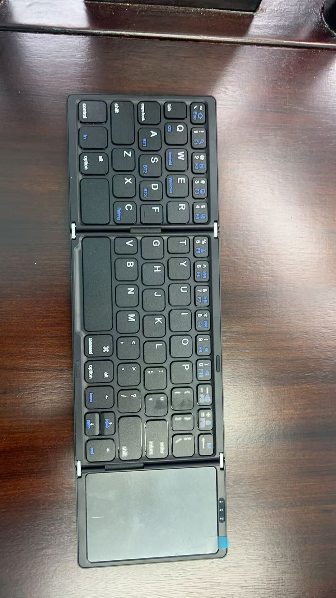 Tri-Fold Bluetooth Keyboard with Touchpad, 64-Key Rechargeable Wireless Keyboard