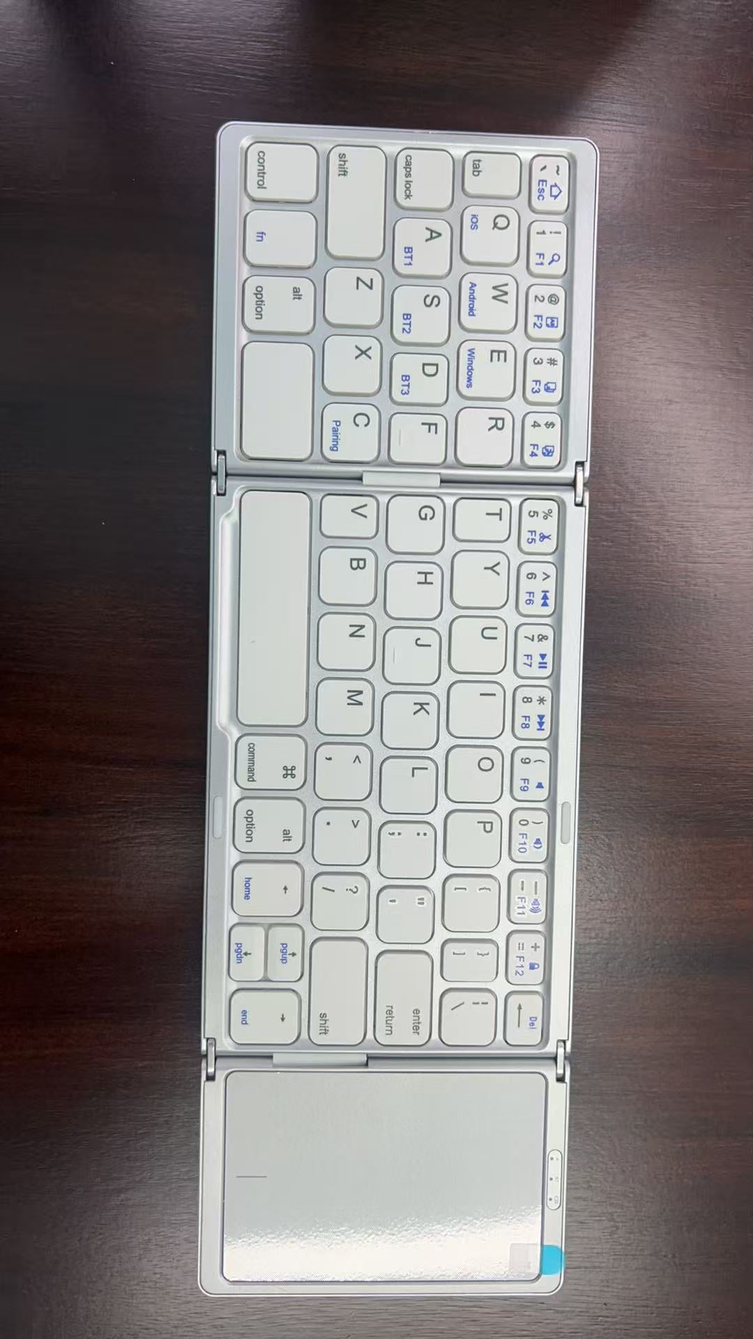 Tri-Fold Bluetooth Keyboard with Touchpad, 64-Key Rechargeable Wireless Keyboard